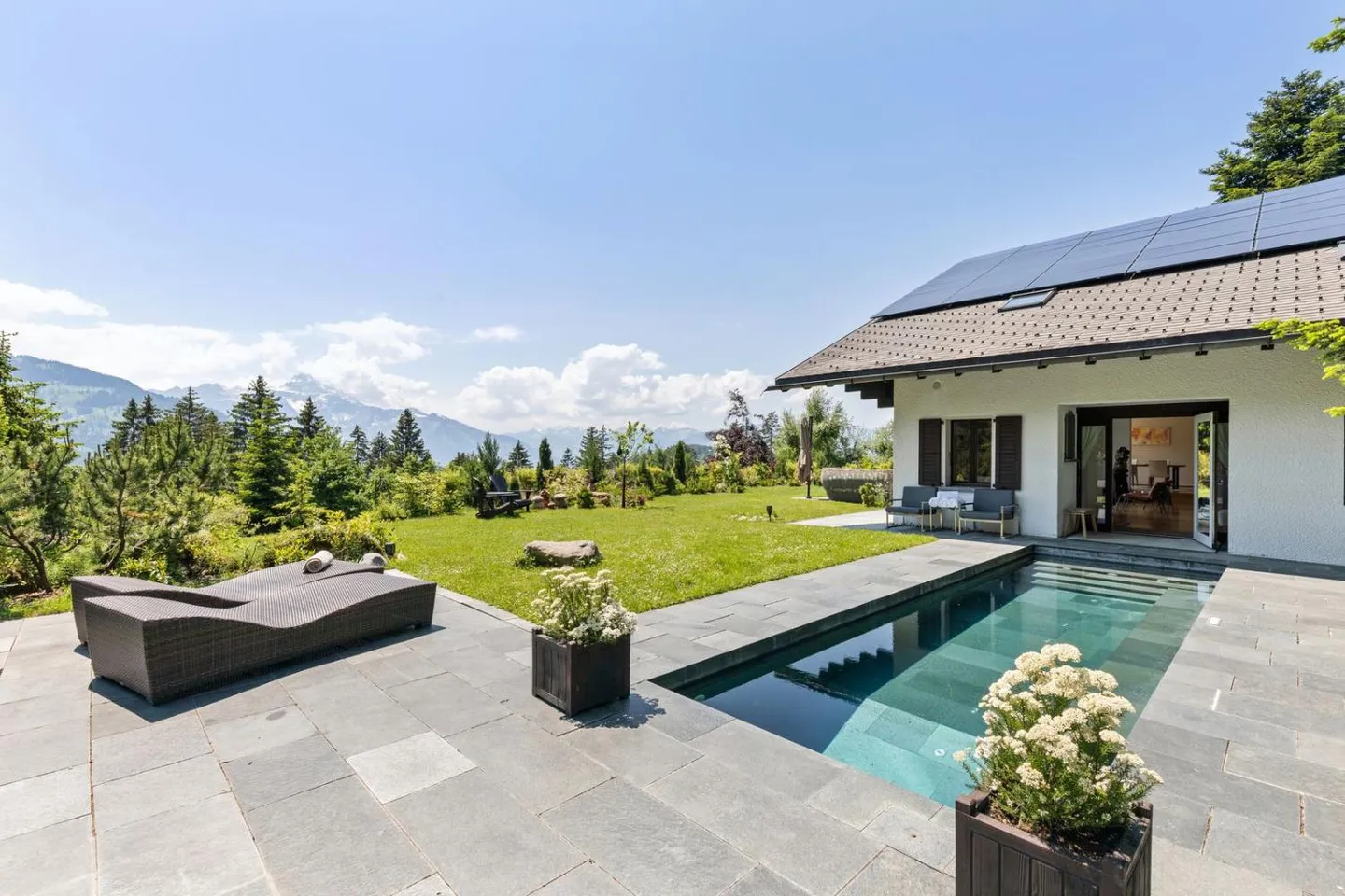Spacious chalet with heated pool and stunning views of the Alps - Photo 1 of 13