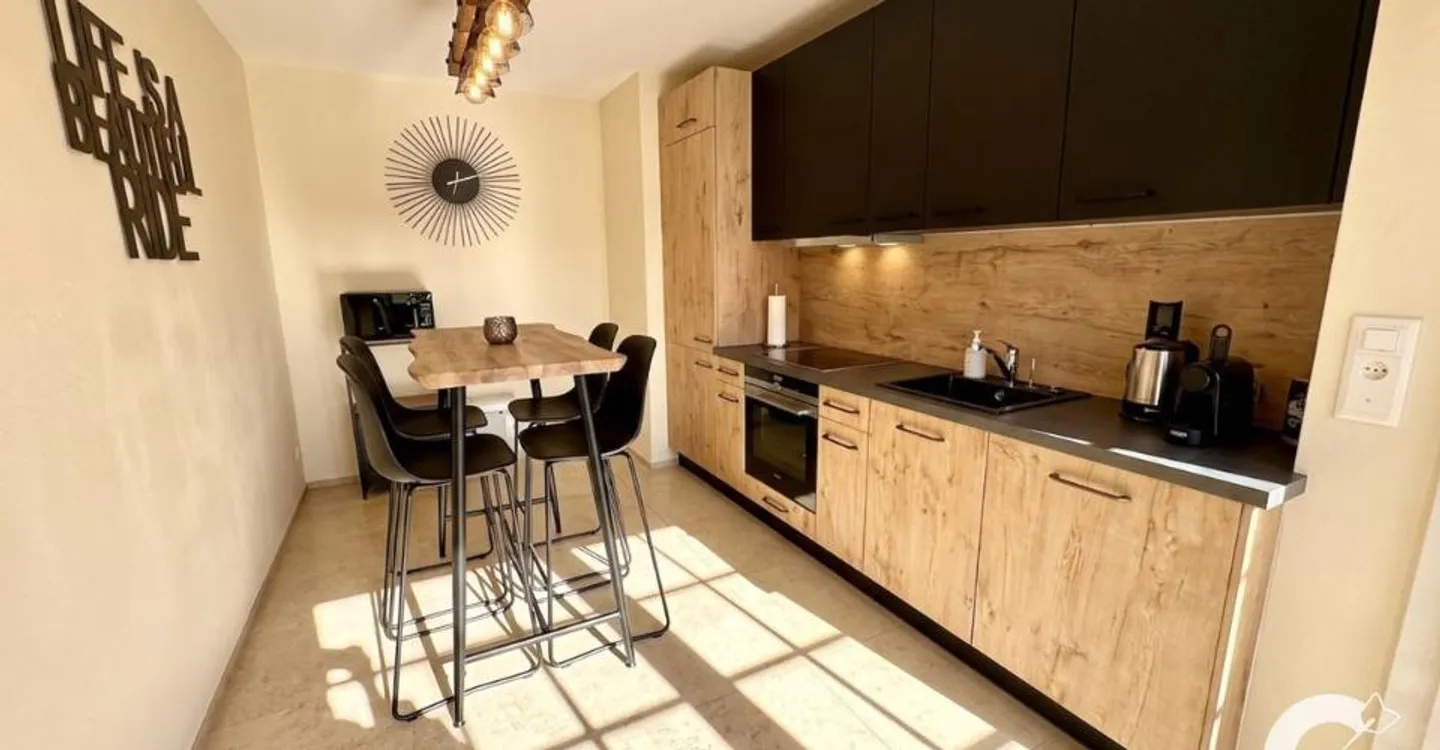 Charming Duplex with Rental Loft - Photo 7 of 9