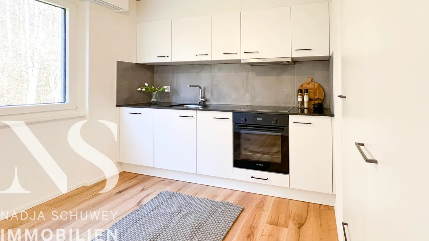 Appartement confortable de 3,5 pièces, emplacement calme, au cœur de Tafers - Photo 3 sur 15