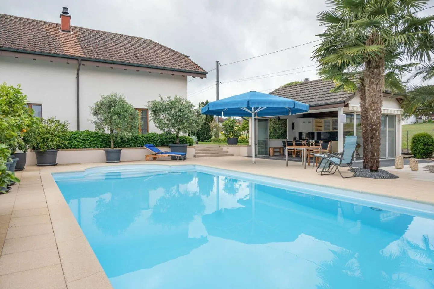 Living Oasis in Roggwil: Single Family House with Pool and Beautiful Garden - Photo 1 of 30