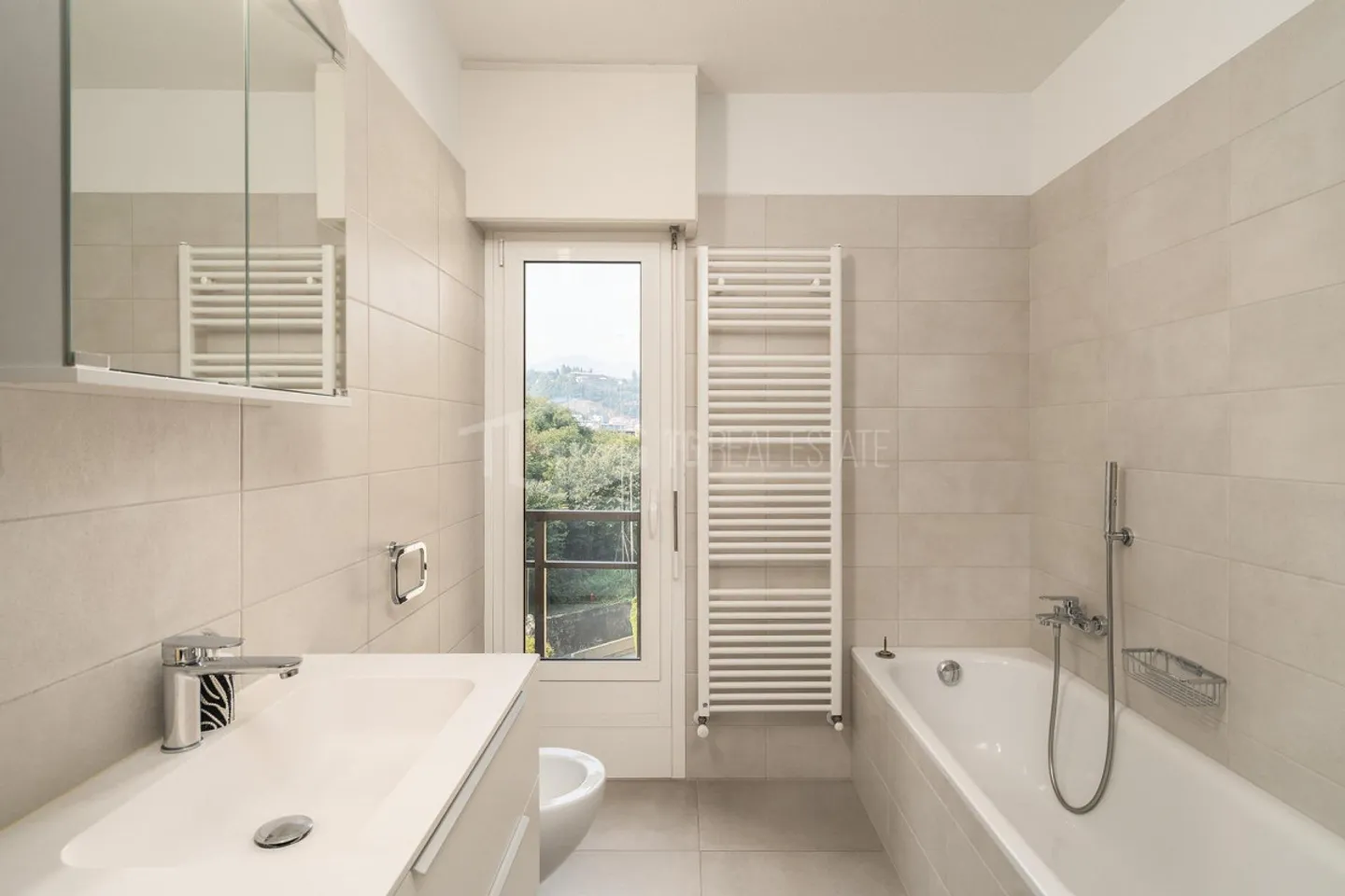 Wohnung mit Seeblick in Paradiso - Foto 8 von 9