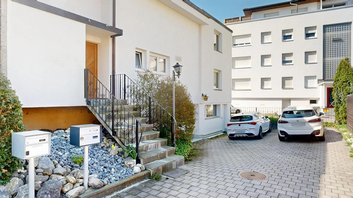 Charmante Doppelhaushälfte mit Garten - Foto 16 von 18