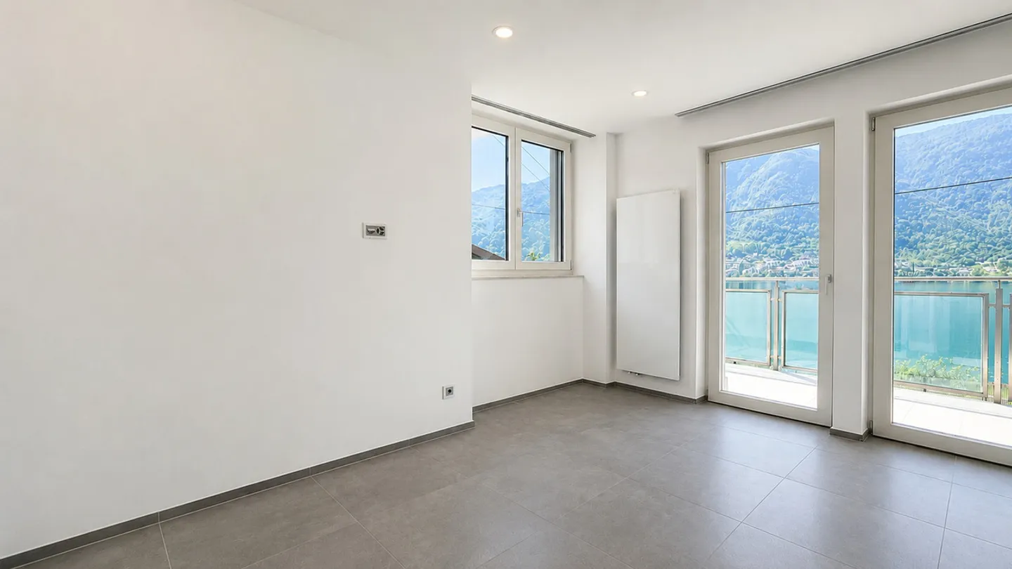 Elegant 4.5-room apartment with stunning lake view in Capolago - Photo 7 of 13