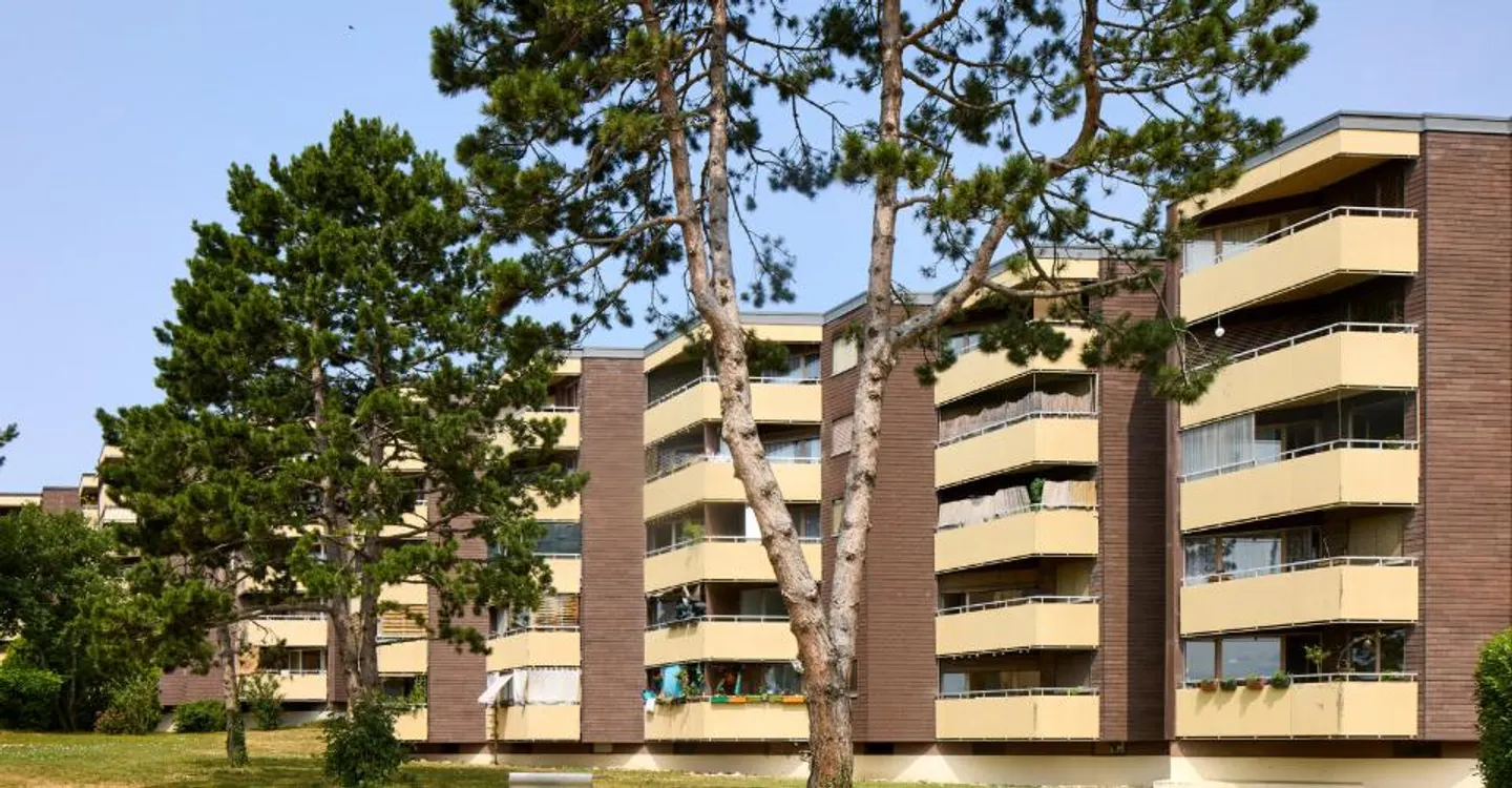Appartement Charmant dans un Quartier Verdoyant - Photo 2 sur 3