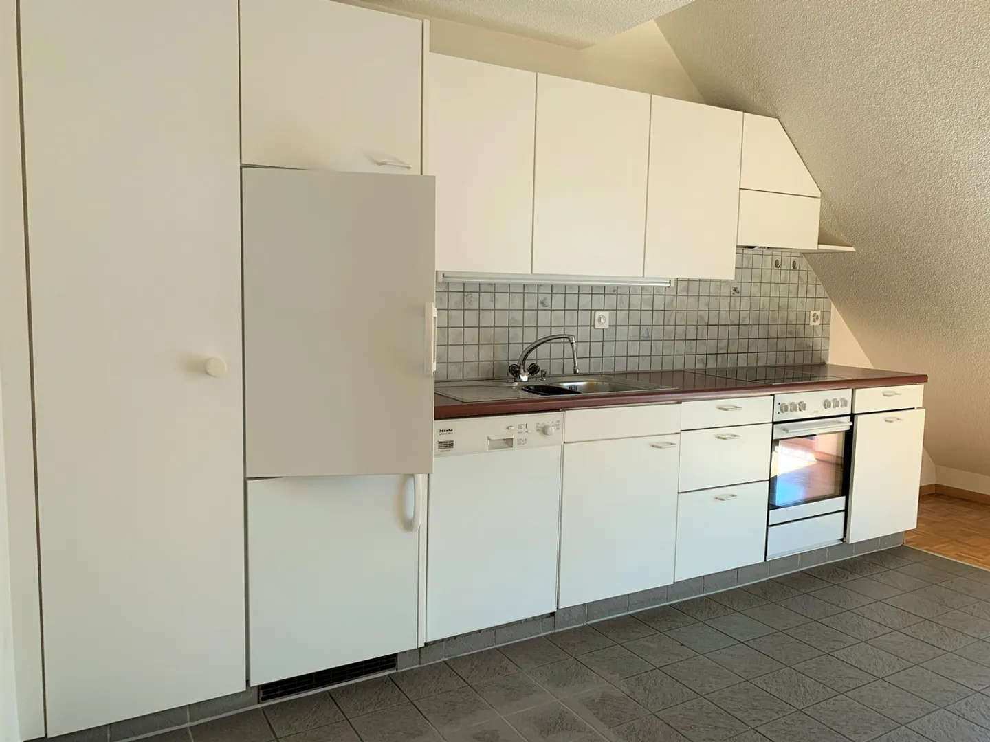 Appartement Duplex Charmant! - Photo 6 sur 8