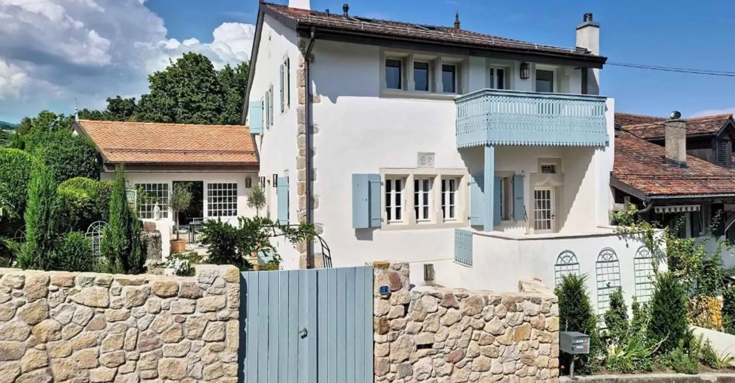 An exceptional residence in the heart of Genolier - Photo 1 of 13