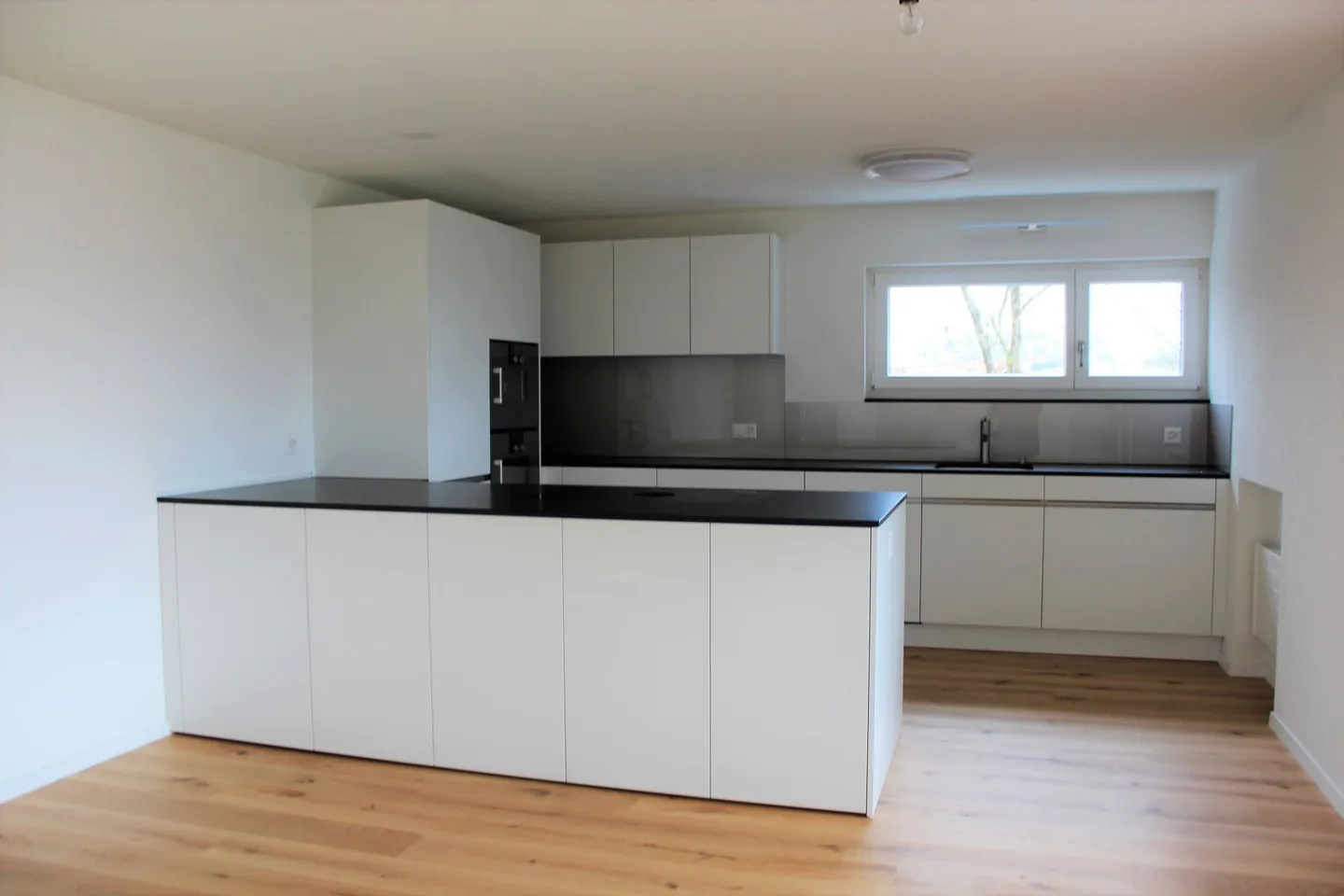 4.5 Ziimmer-Wohnung mit Traumküche, Balkon + Abendsonne - Foto 2 von 13