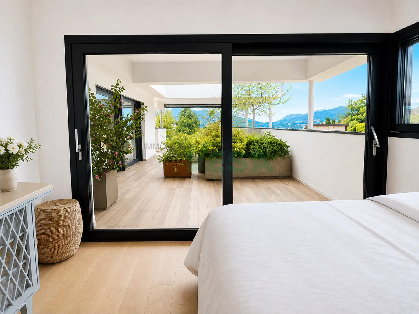 Elegante attico con vista lago - Foto 7 di 11