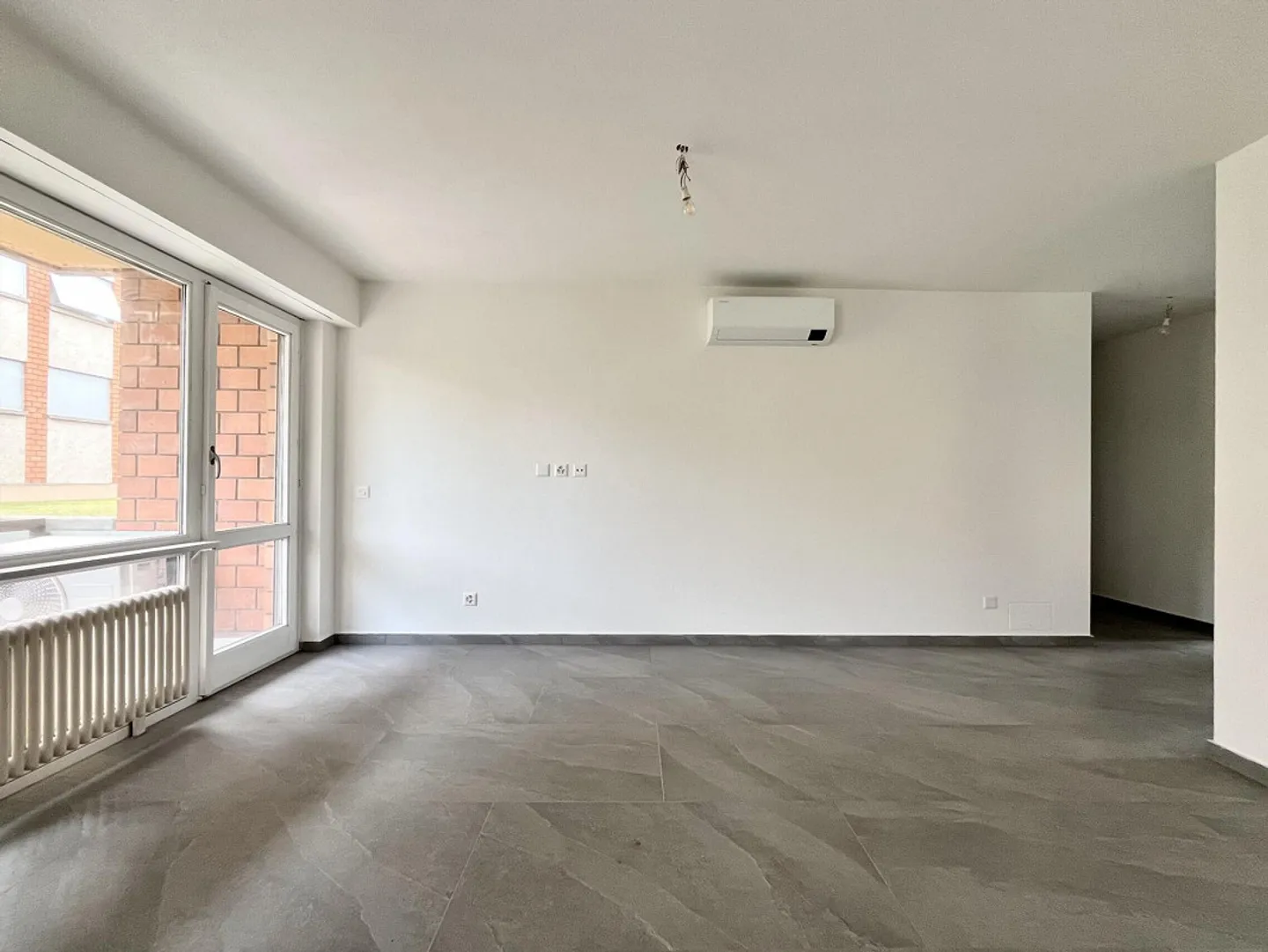 APPARTAMENTO RINNOVATO 3.5 LUMINOSO NEL DISTRETTO CENTRALE DI MENDRISIO - Foto 4 di 10