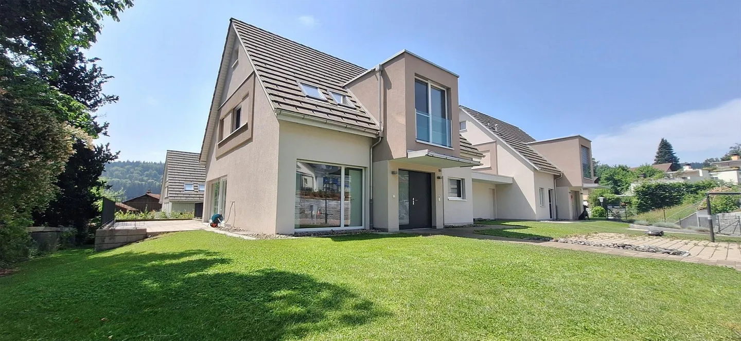 Modern Single-Family Home with High Standard of Development and Plenty of Space - Photo 1 of 14