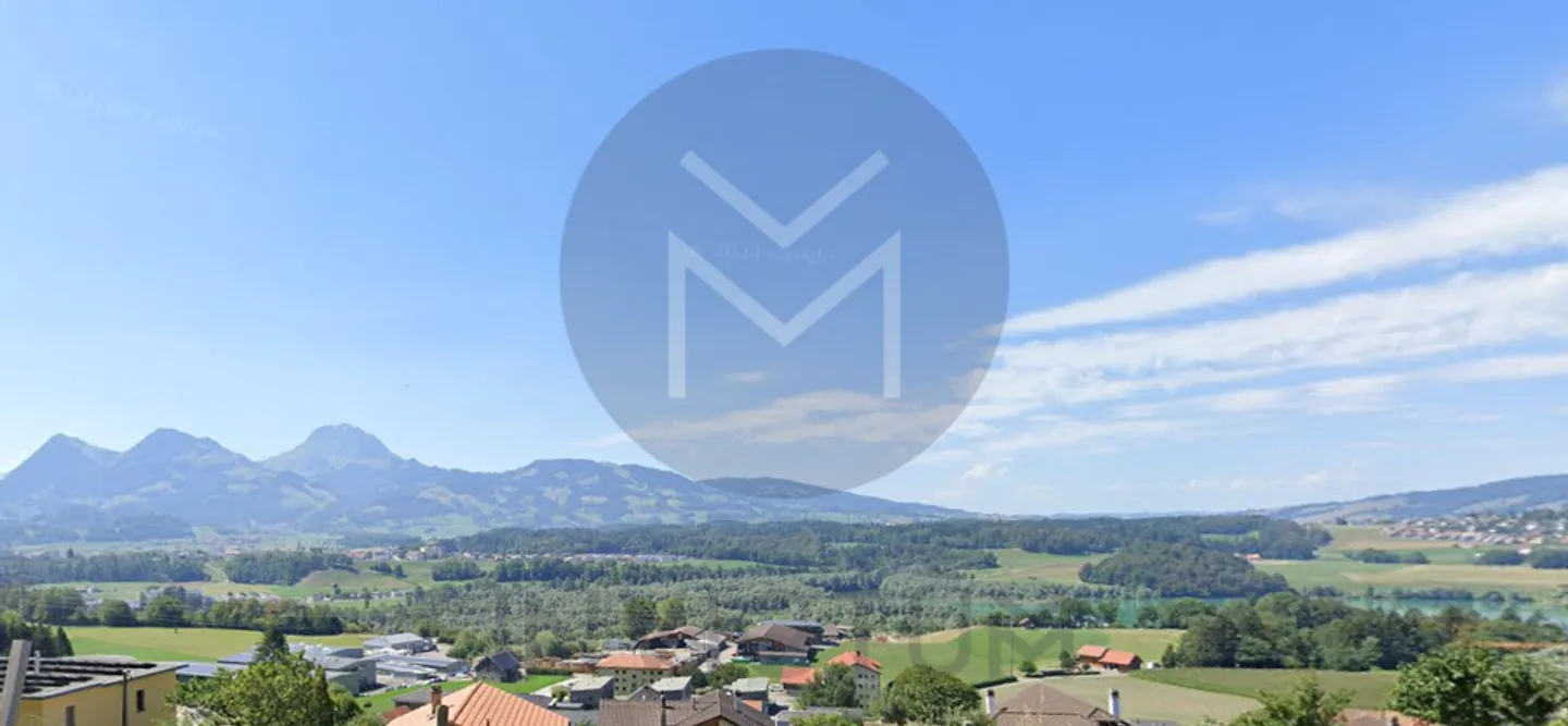 Magnifique Appartement avec Vue sur le Lac et les Montagnes à Botterens - Photo 2 sur 4