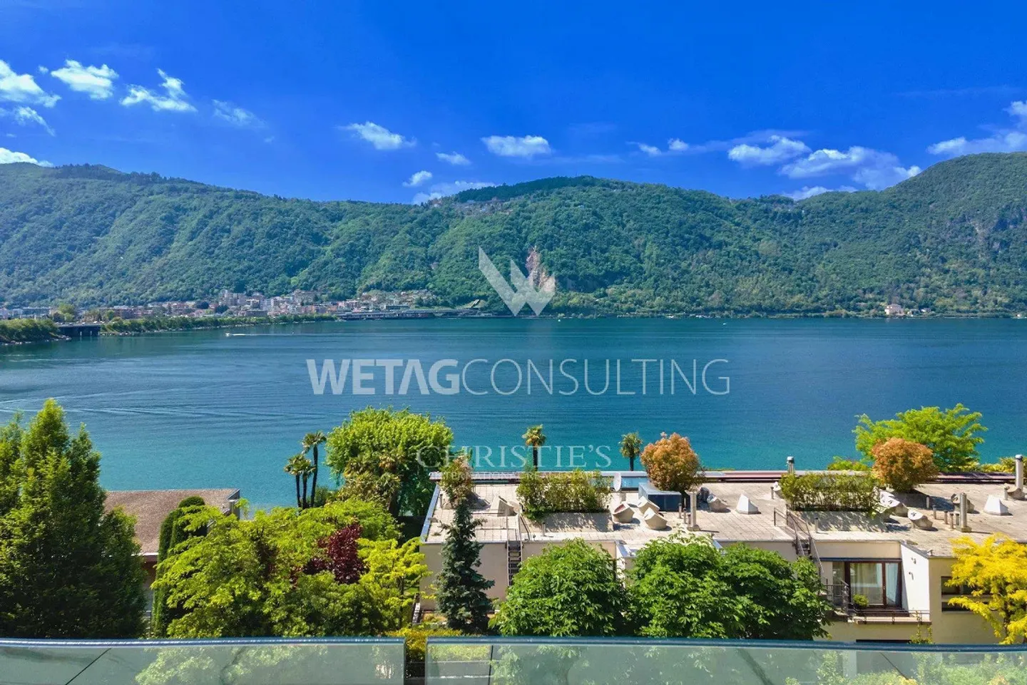 Attico moderno con grande terrazza e vista mozzafiato sul lago a Lu... - Foto 1 di 10