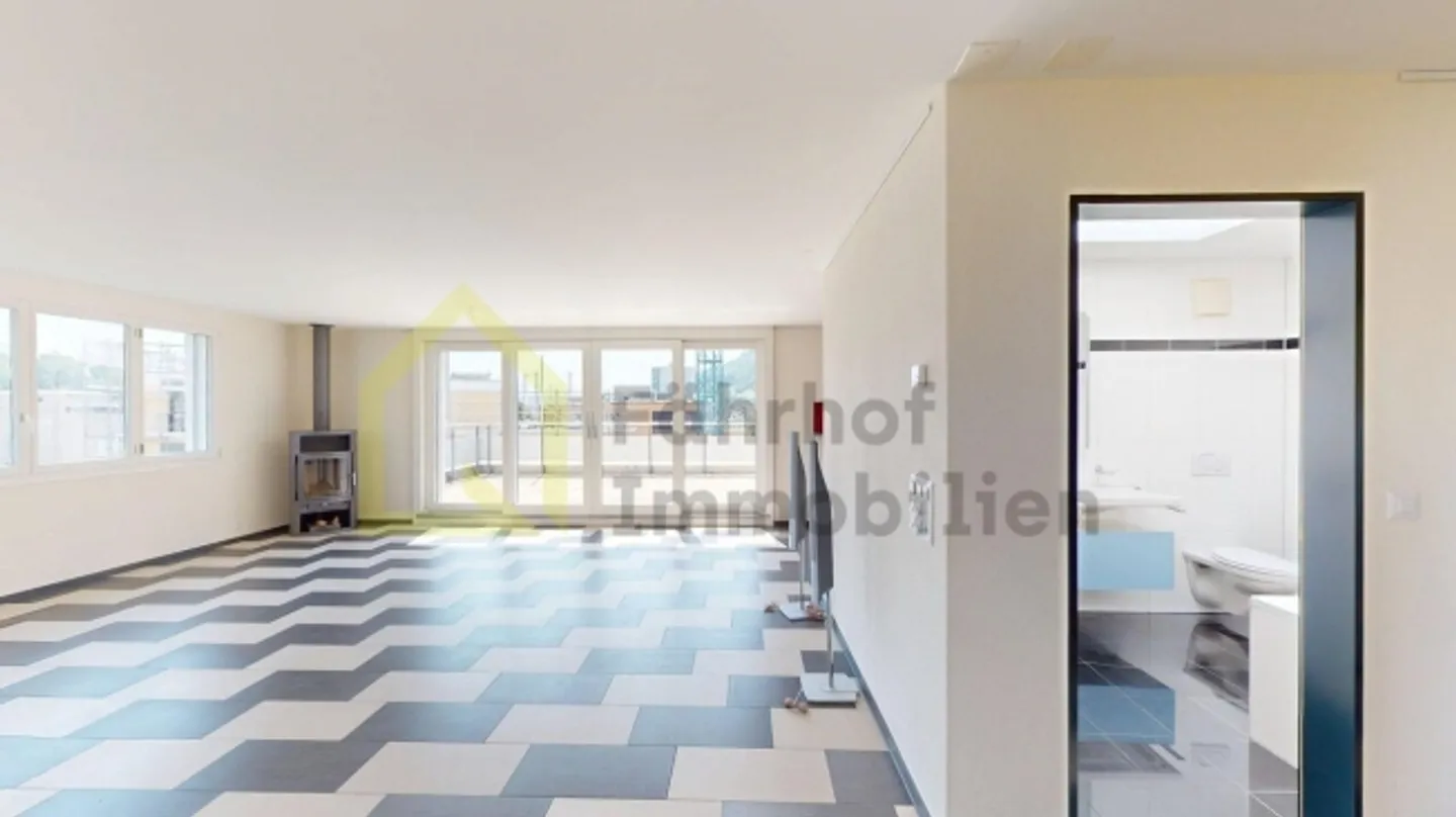 Attico con grande giardino d'inverno e terrazza soleggiata - Foto 7 di 12