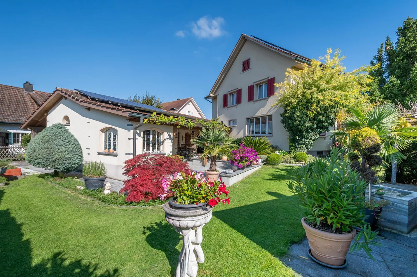 Freistehendes Einfamilienhaus mit sonnigem Gartenparadies - Foto 6 von 21