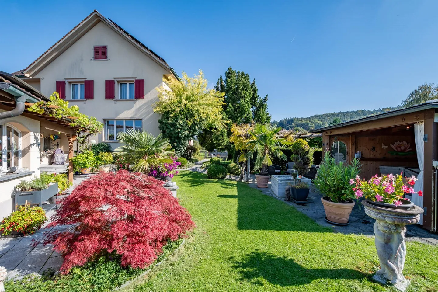 Freistehendes Einfamilienhaus mit sonnigem Gartenparadies - Foto 7 von 21