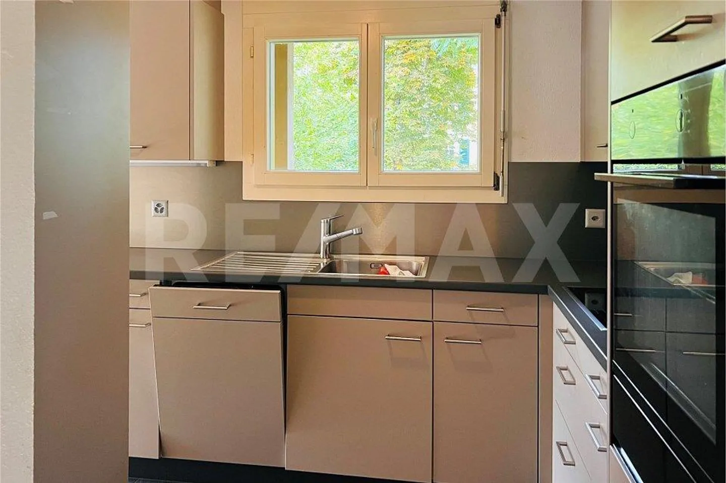 Renovierte 4,5 Zimmerwohnung mitten im Zentrum und mitten im Grünen - Foto 7 von 13