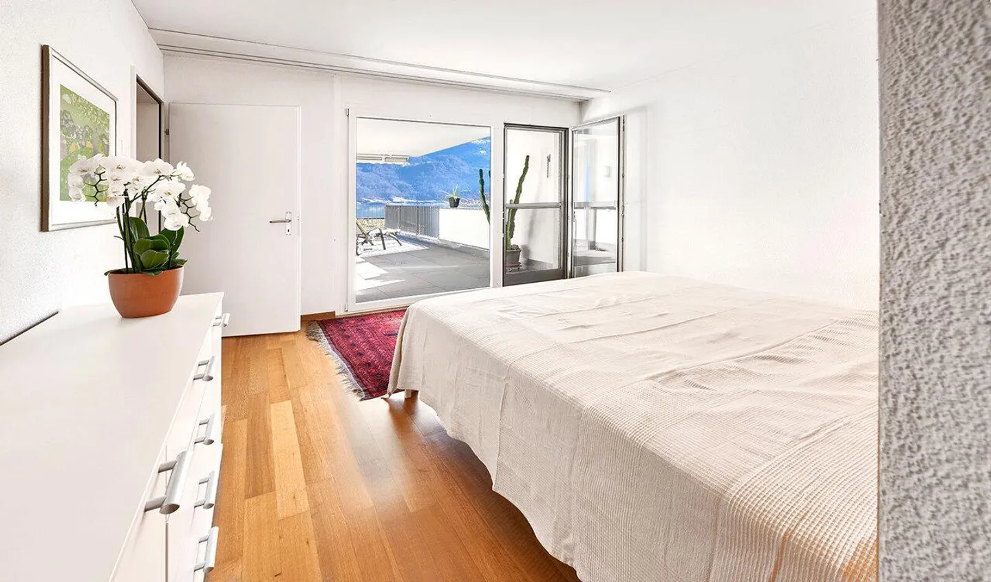 Sonnenverwöhnte Terrassenwohnung mit Seeblick - Foto 4 von 8