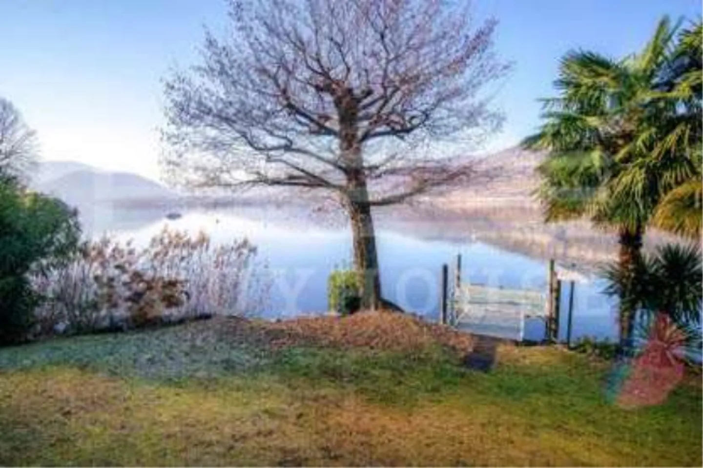 Attico raffinato con terrazza sul tetto e vista lago - Foto 8 di 9