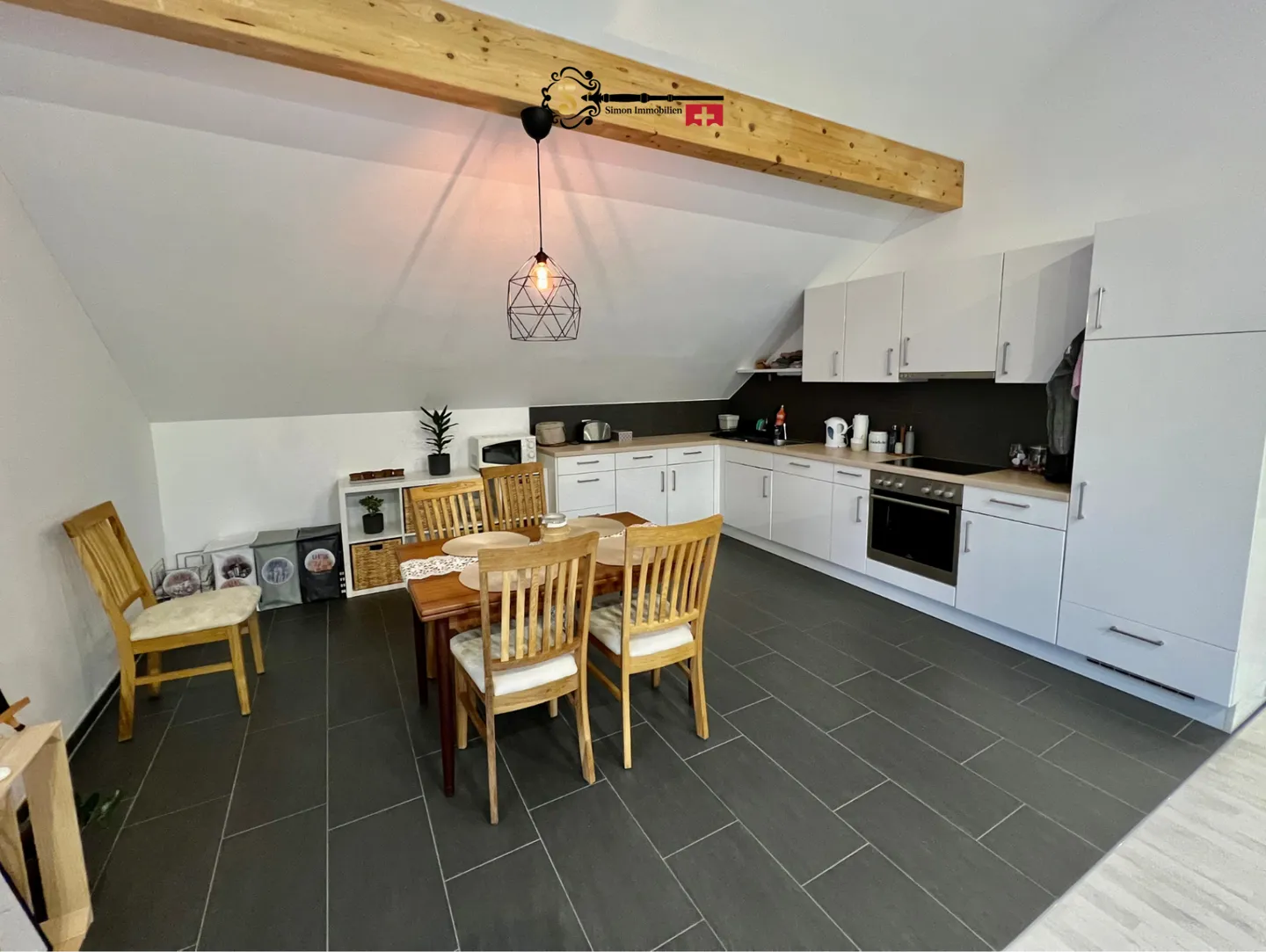 Loft-like living under the roof - Photo 4 of 10