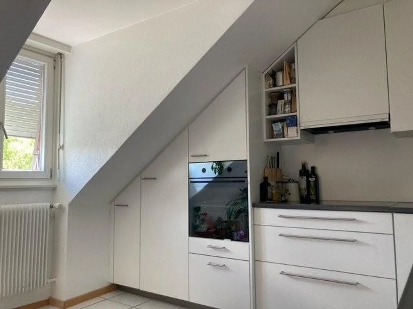 Geräumige Dachgeschosswohnung in Elfenau - Foto 1 von 9
