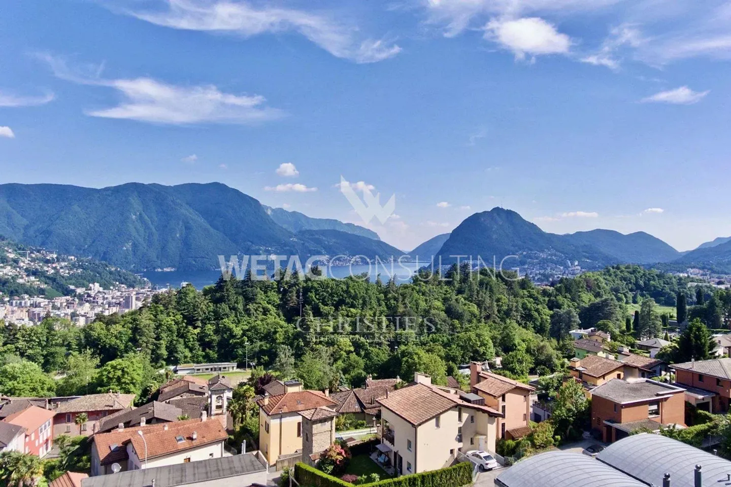 Terrain à bâtir avec vue sur le lac de Lugano dans un quartier résidentiel prestigieux à vendre - Photo 1 sur 9