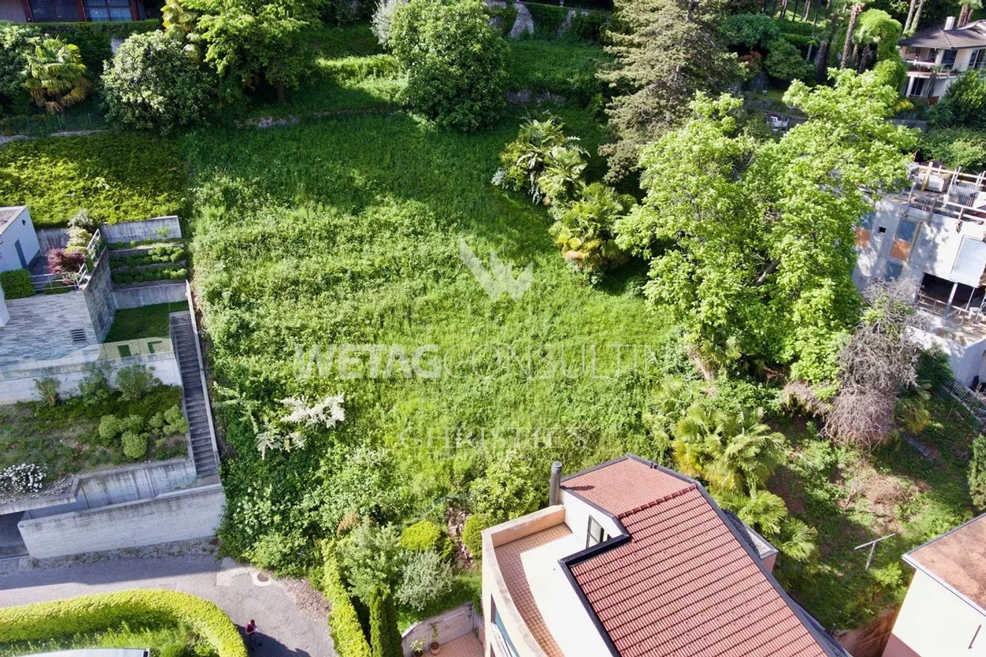 Terrain à bâtir avec vue sur le lac de Lugano dans un quartier résidentiel prestigieux à vendre - Photo 2 sur 9
