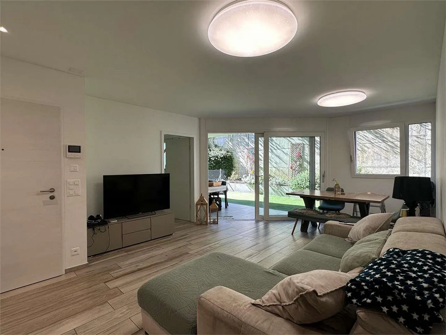 Raffinato appartamento 3.5 locali con giardino privato a Sorengo - Foto 3 di 12