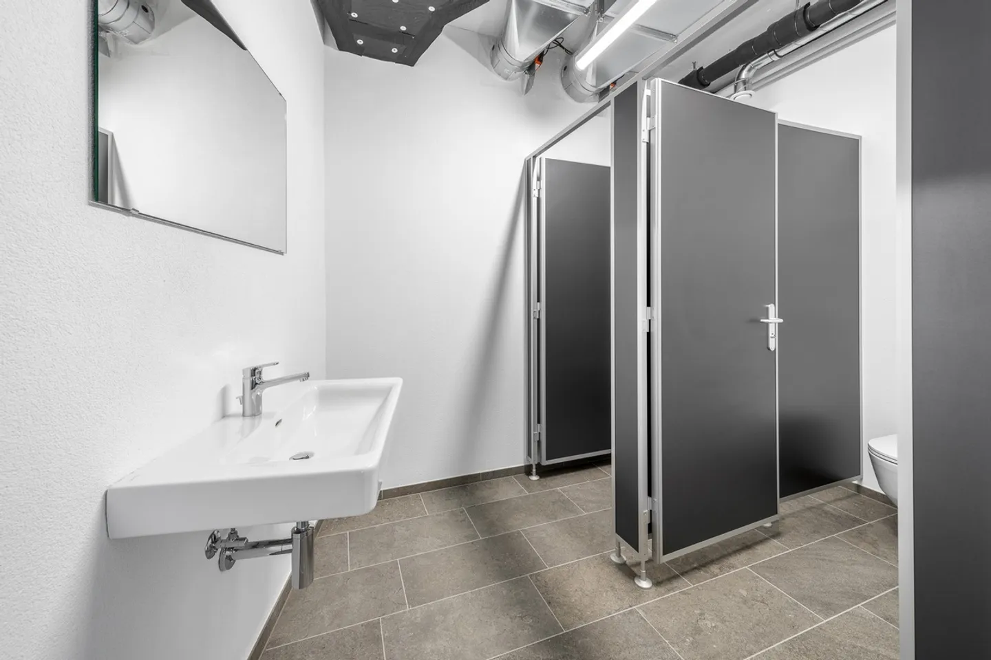 Bureau rénové directement à la gare de Baden - Photo 10 sur 11