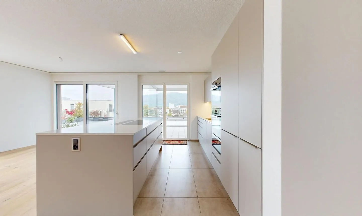 Penthouse élégant et lumineux avec vue dégagée et grande terrasse - Photo 4 sur 11