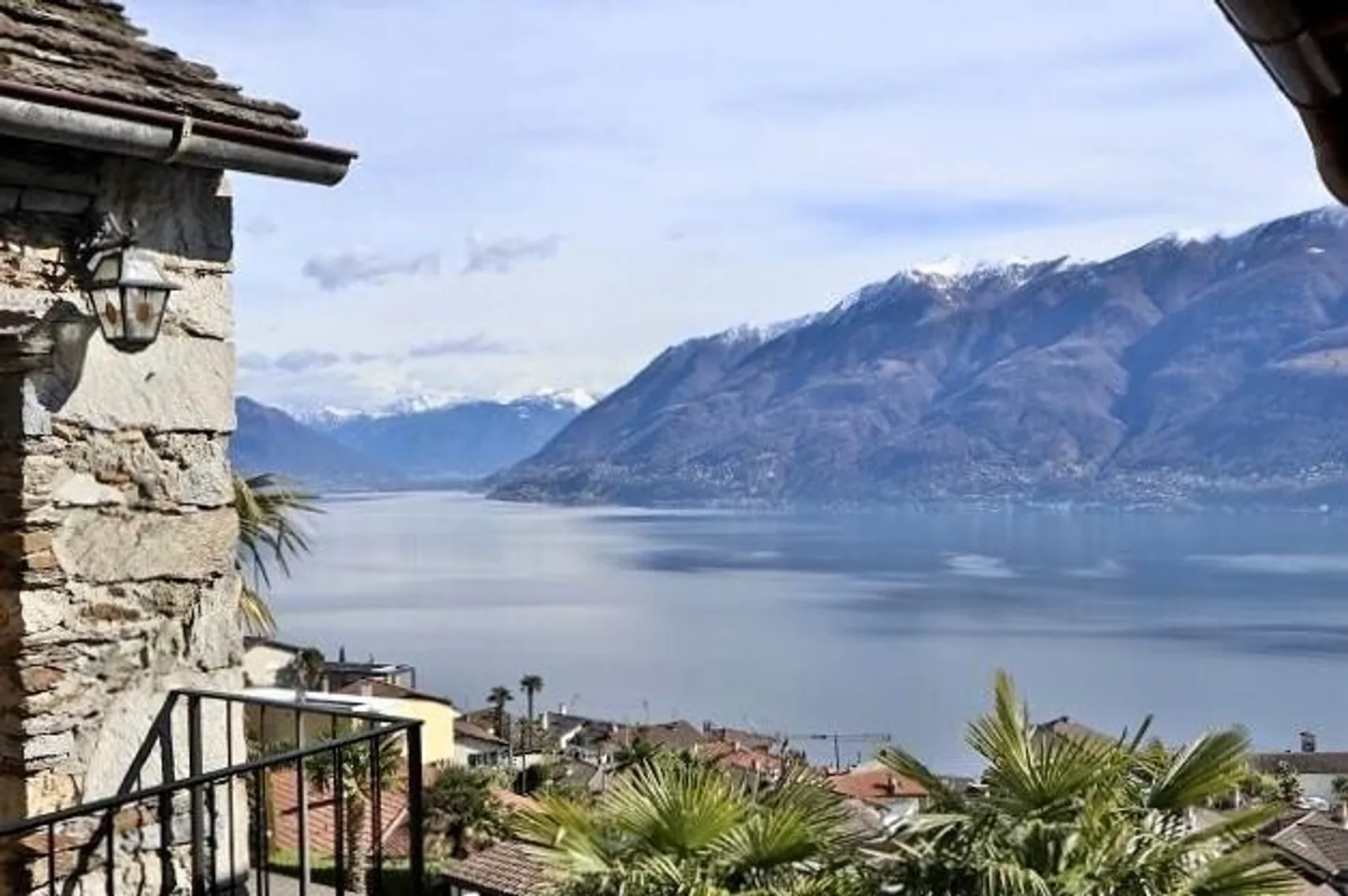 Appartamento di 2 1/2 locali ultimo piano con giardino e vista lago - Foto 1 di 13