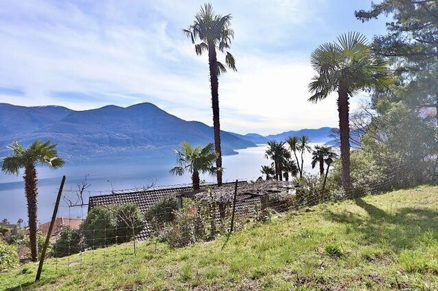 Appartamento di 2 1/2 locali ultimo piano con giardino e vista lago - Foto 11 di 13