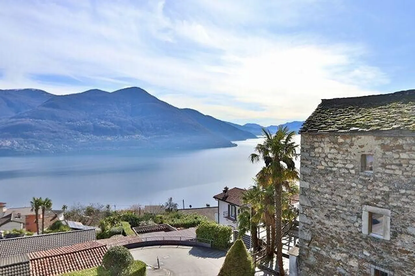 Appartamento di 2 1/2 locali ultimo piano con giardino e vista lago - Foto 12 di 13