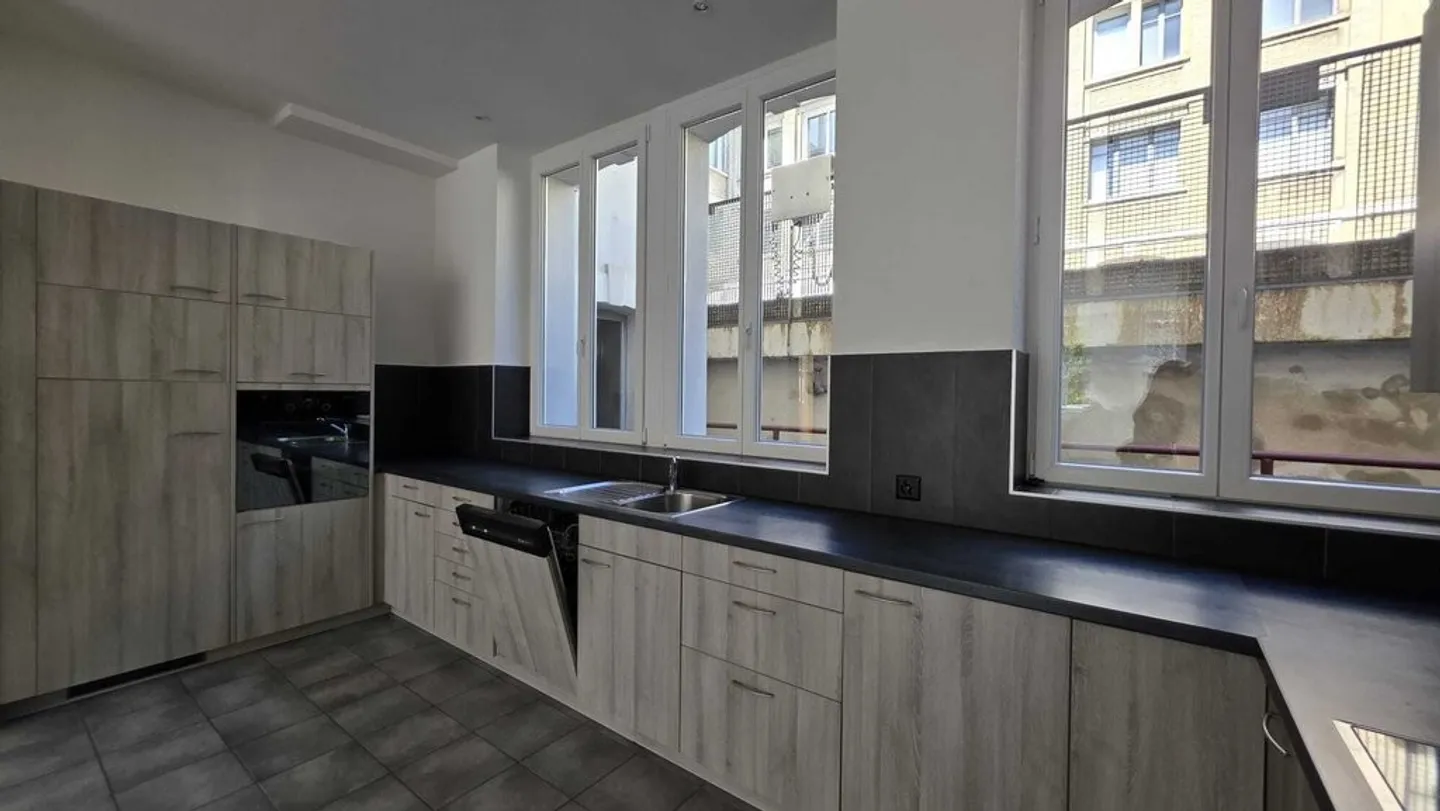 Appartement en Ville avec Cuisine Moderne - Photo 4 sur 11
