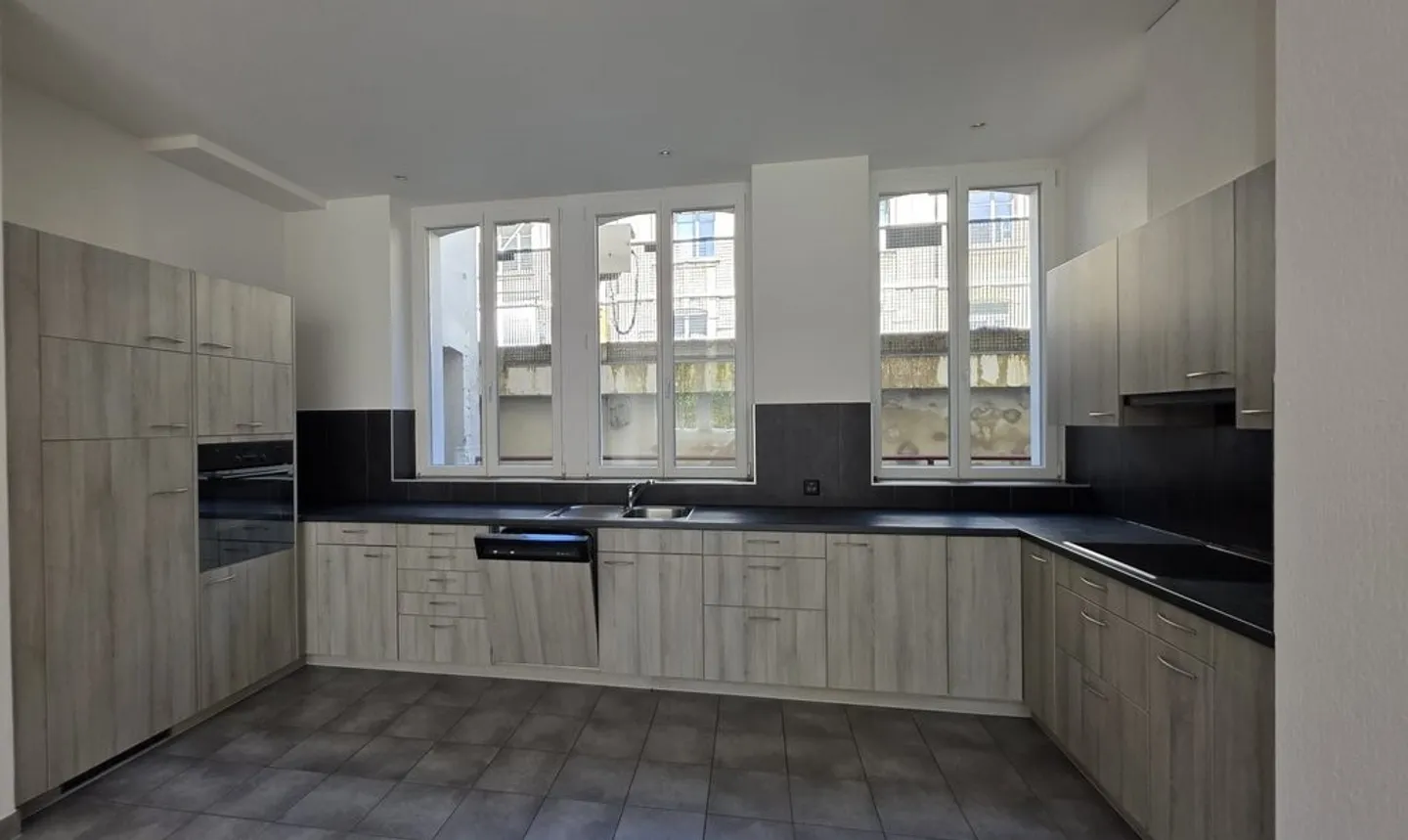 Appartement en Ville avec Cuisine Moderne - Photo 5 sur 11