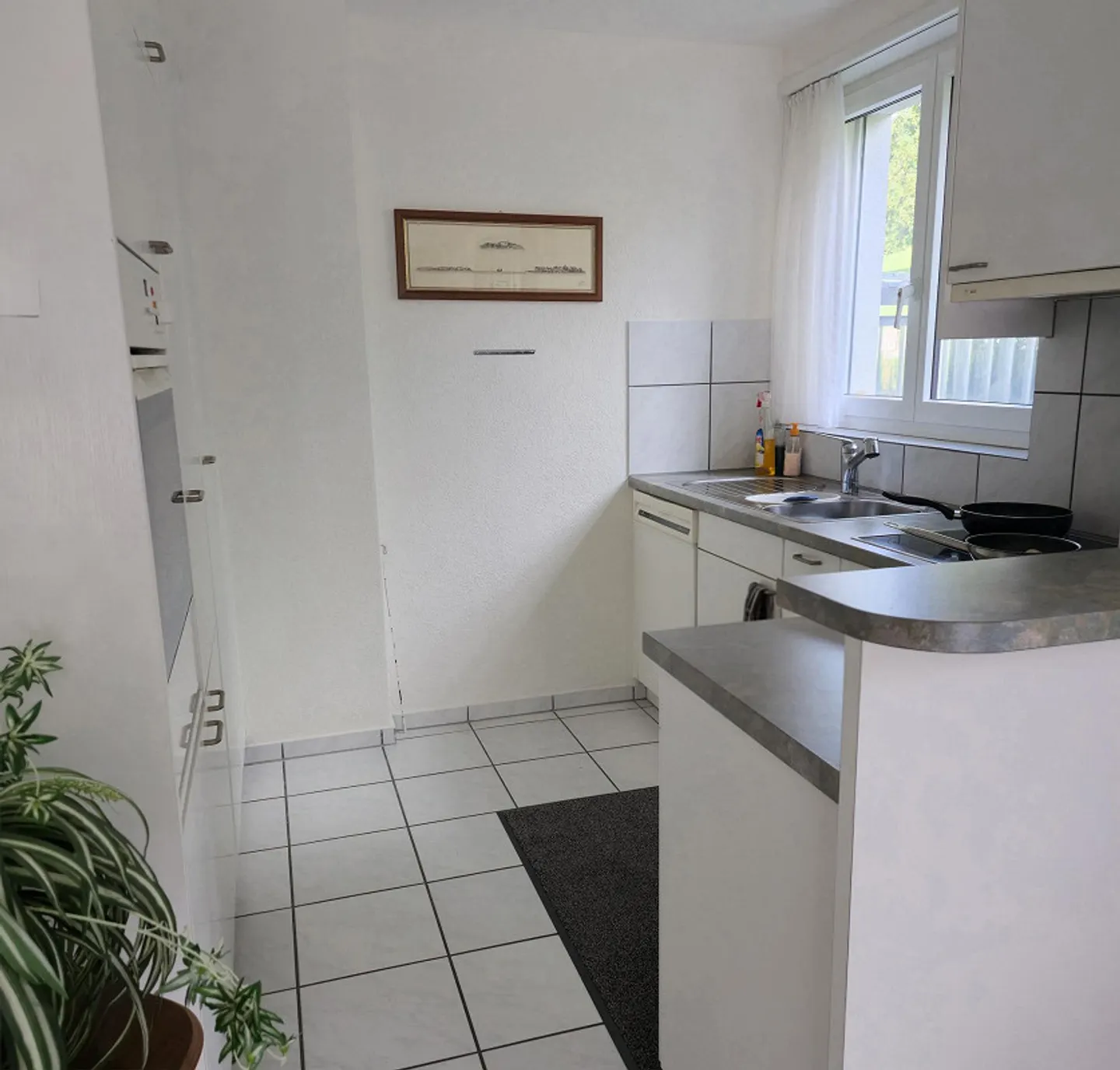 Bright 1.5-room apartment with garden seating area and parking space - Photo 2 of 7