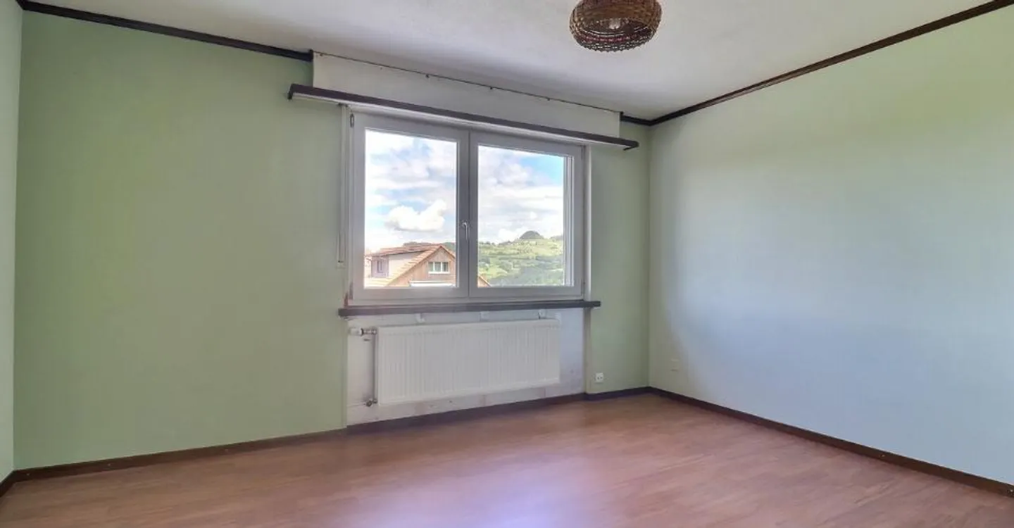 Appartamento affascinante di 4,5 stanze con balcone e garage - Foto 10 di 13