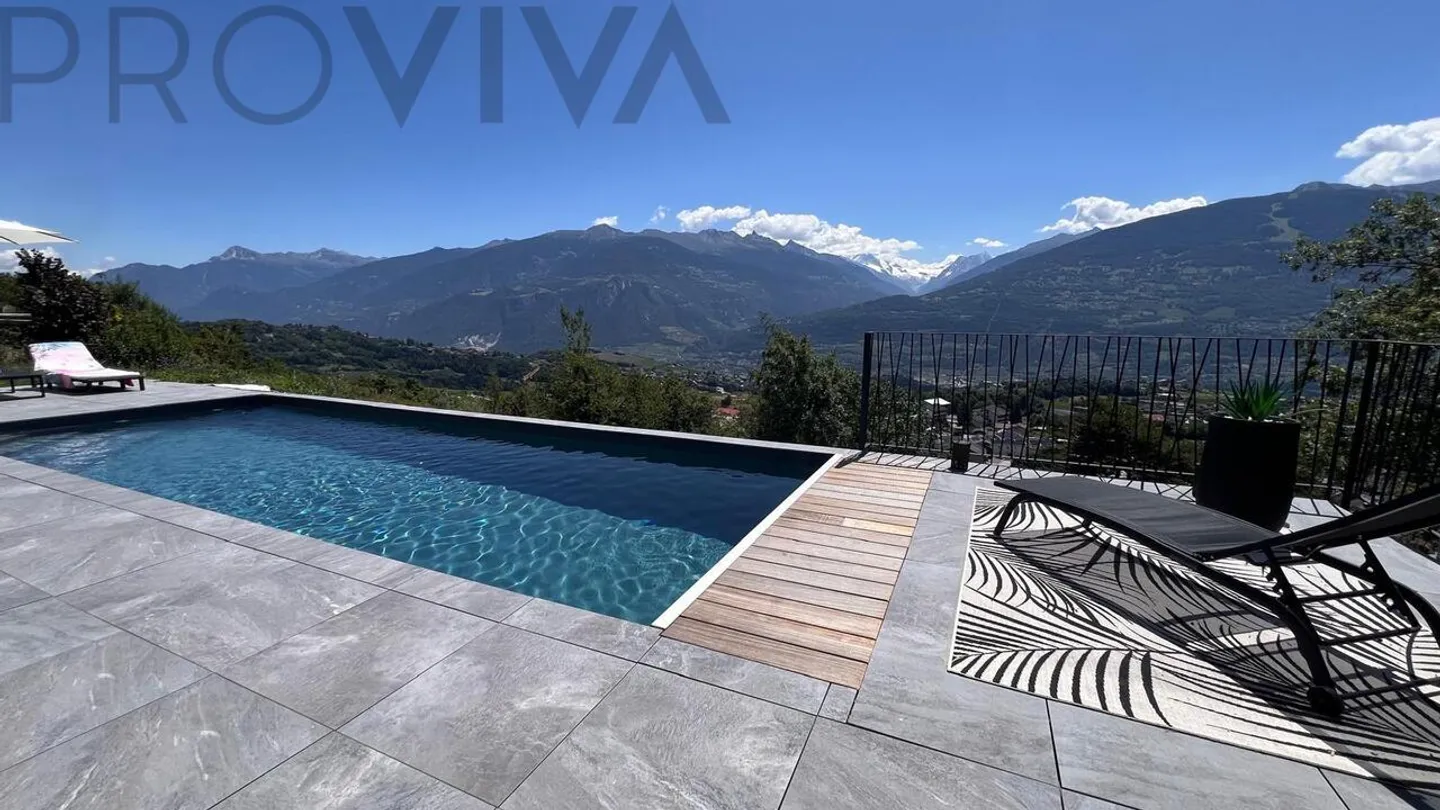 Modernly equipped, fantastic view, heated outdoor pool included - Photo 1 of 7