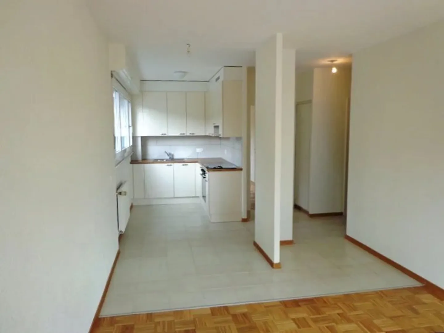 Charmante 2-Zimmer-Wohnung in der Nähe des Zentrums von Renens. - Foto 3 von 7