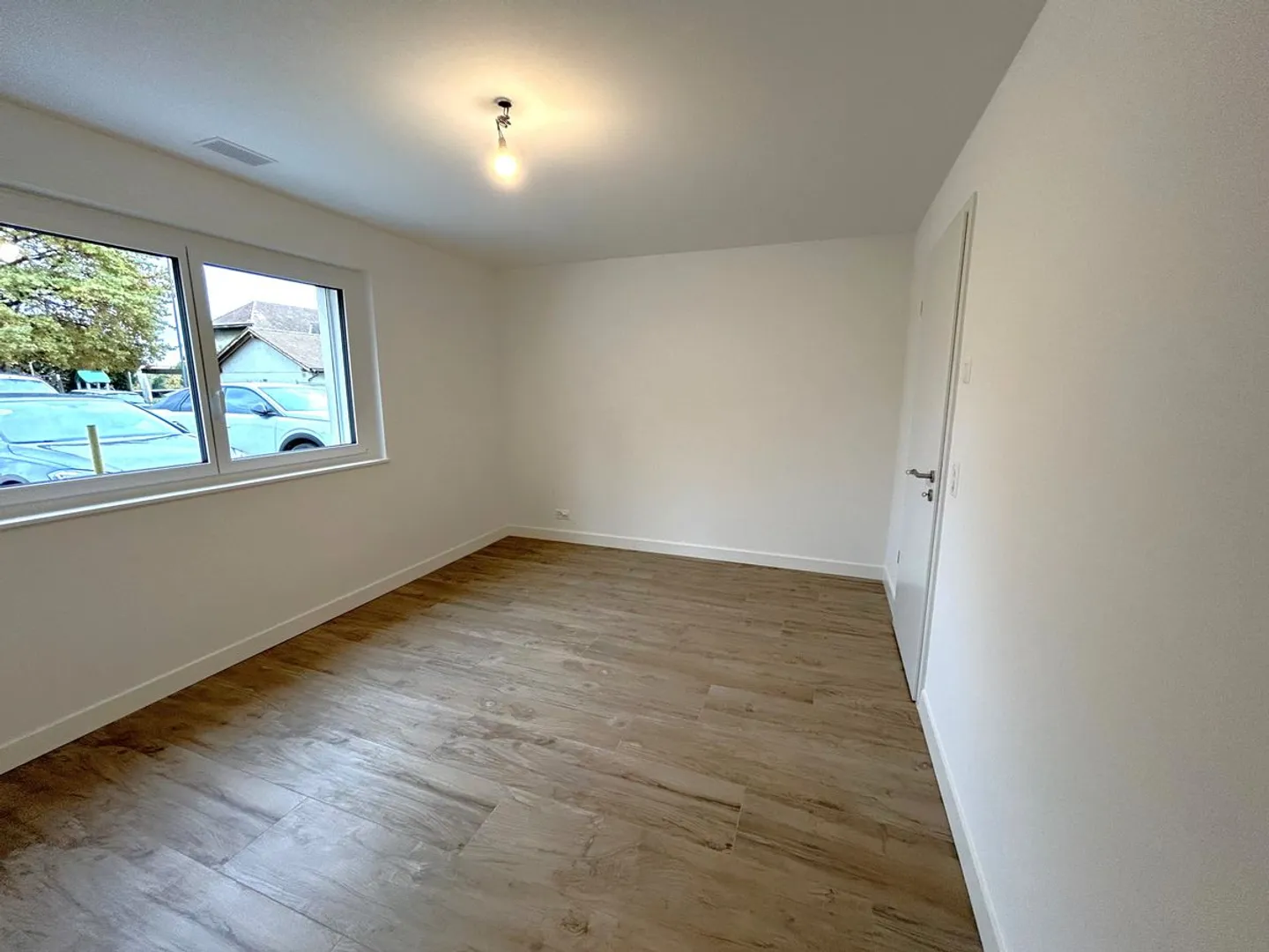 Appartement MINERGIE 2,5 pièces au rez-de-chaussée avec terrasse et jardin - Photo 8 sur 13