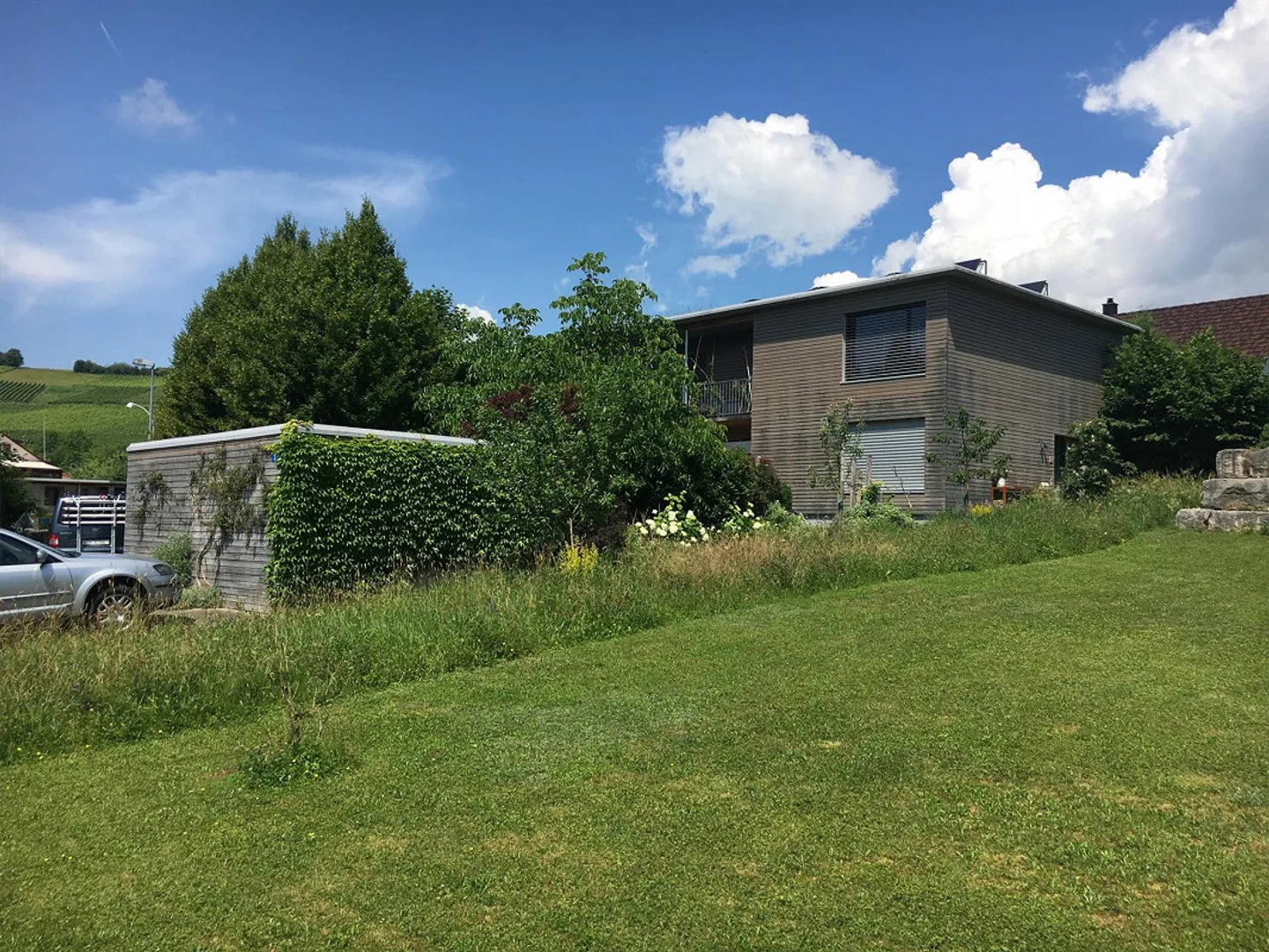 Grosses Einfamilienhaus mit Garten und Garage am Rande der Rebberge - Foto 13 von 14