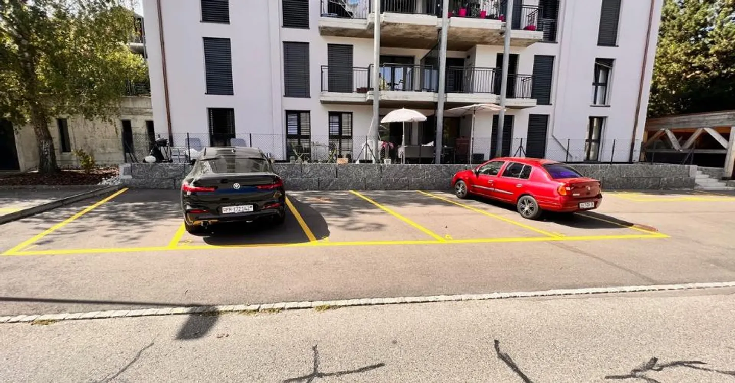 Outdoor parking spaces - Photo 1 of 2