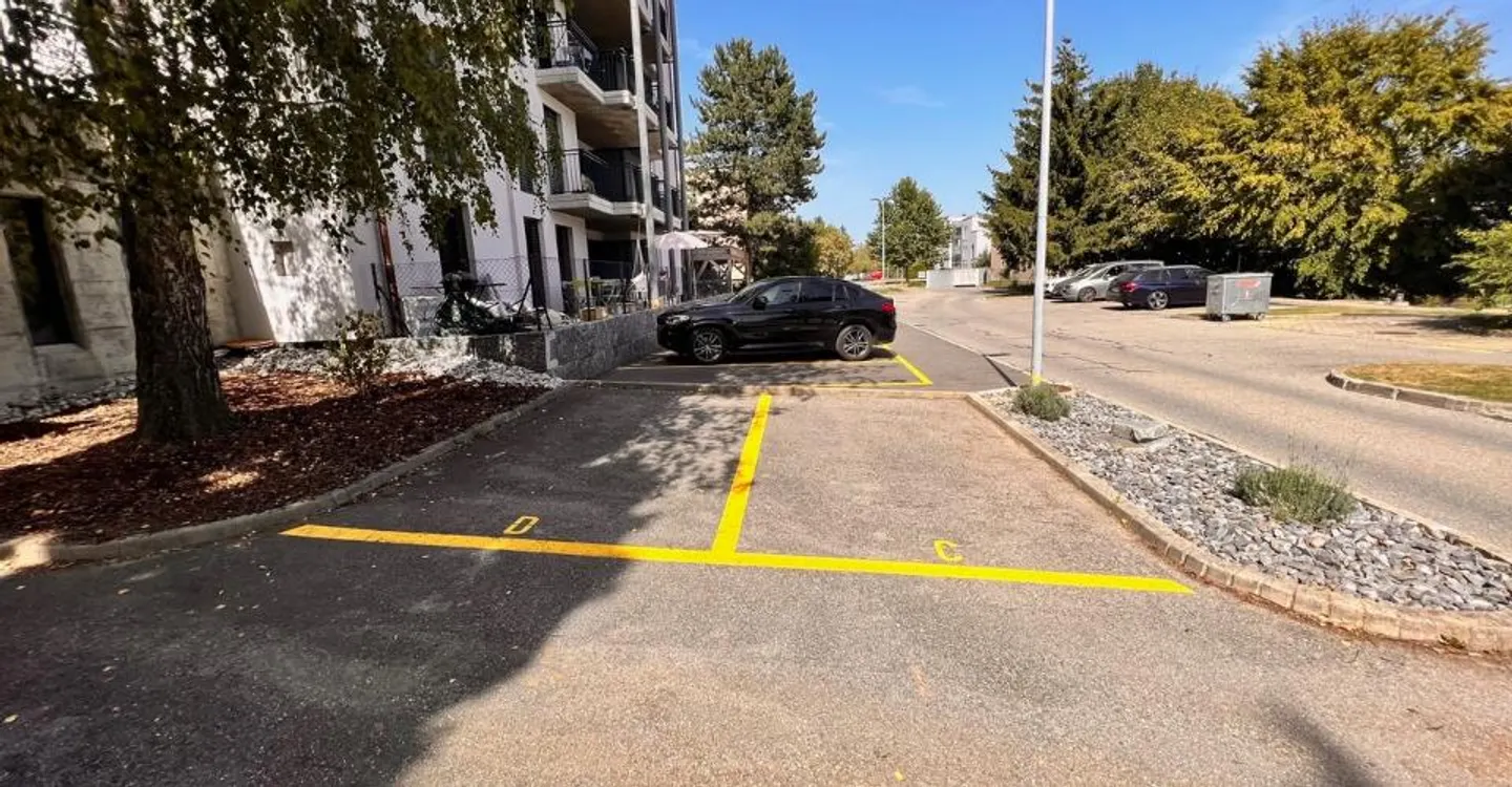 Outdoor parking spaces - Photo 2 of 2