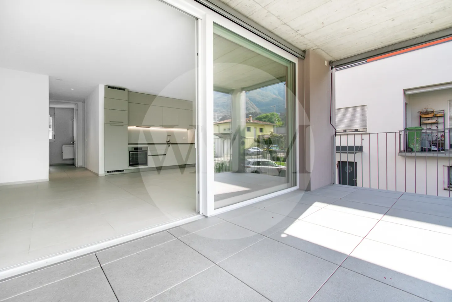 Appartamento moderno di 2,5 stanze con terrazza e giardino privato - Foto 1 di 10