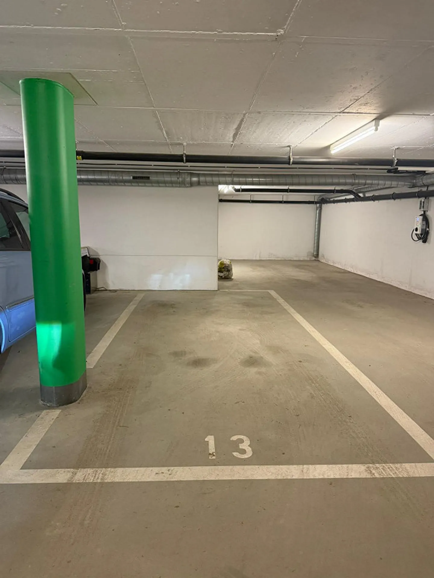 Place de parking dans un garage souterrain près de la gare d'Uster - Photo 1 sur 2
