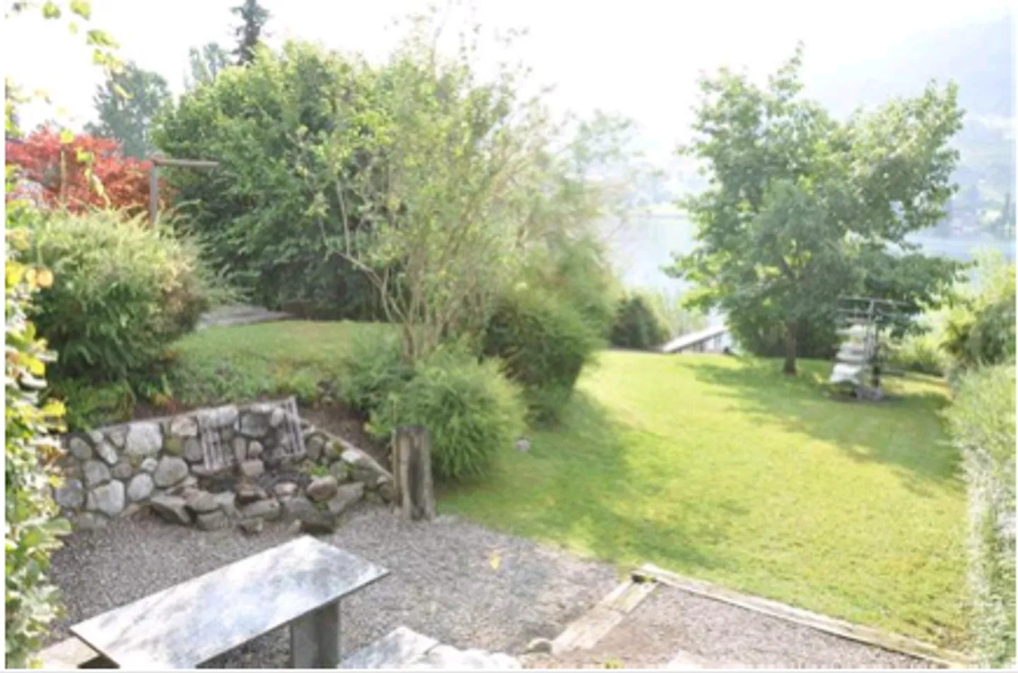 Appartamento con terrazza e vista mozzafiato sul lago e area giardino - Foto 7 di 13