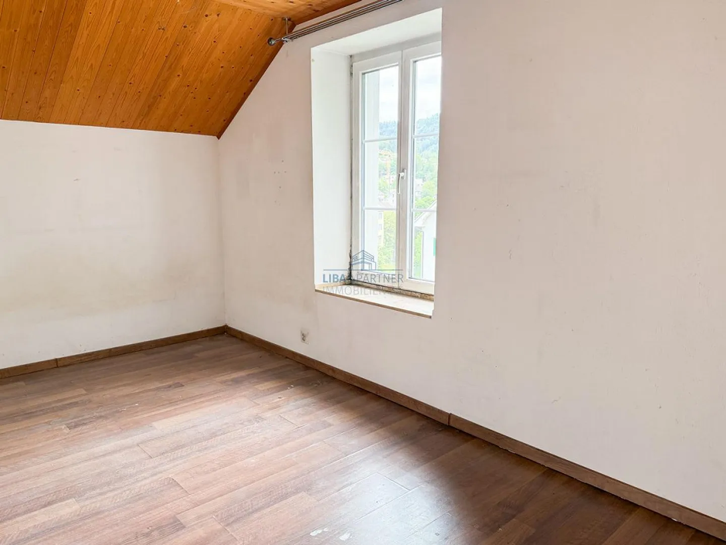Great Potential: House with Flexible Usage and Expansion Options - Photo 9 of 18