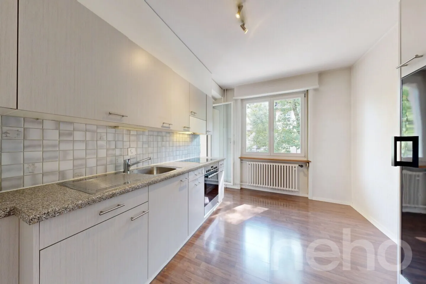 Charming Apartment with Garage - Photo 1 of 12