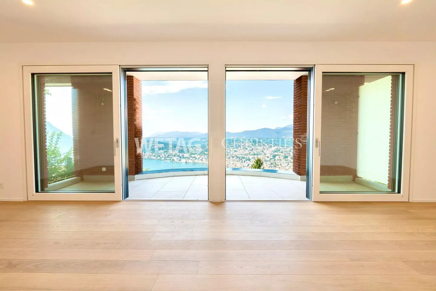 Villa a schiera moderna con giardino privato e vista panoramica sul lago di Lugano a Lugano-Aldesago in vendita - Foto 1 di 10