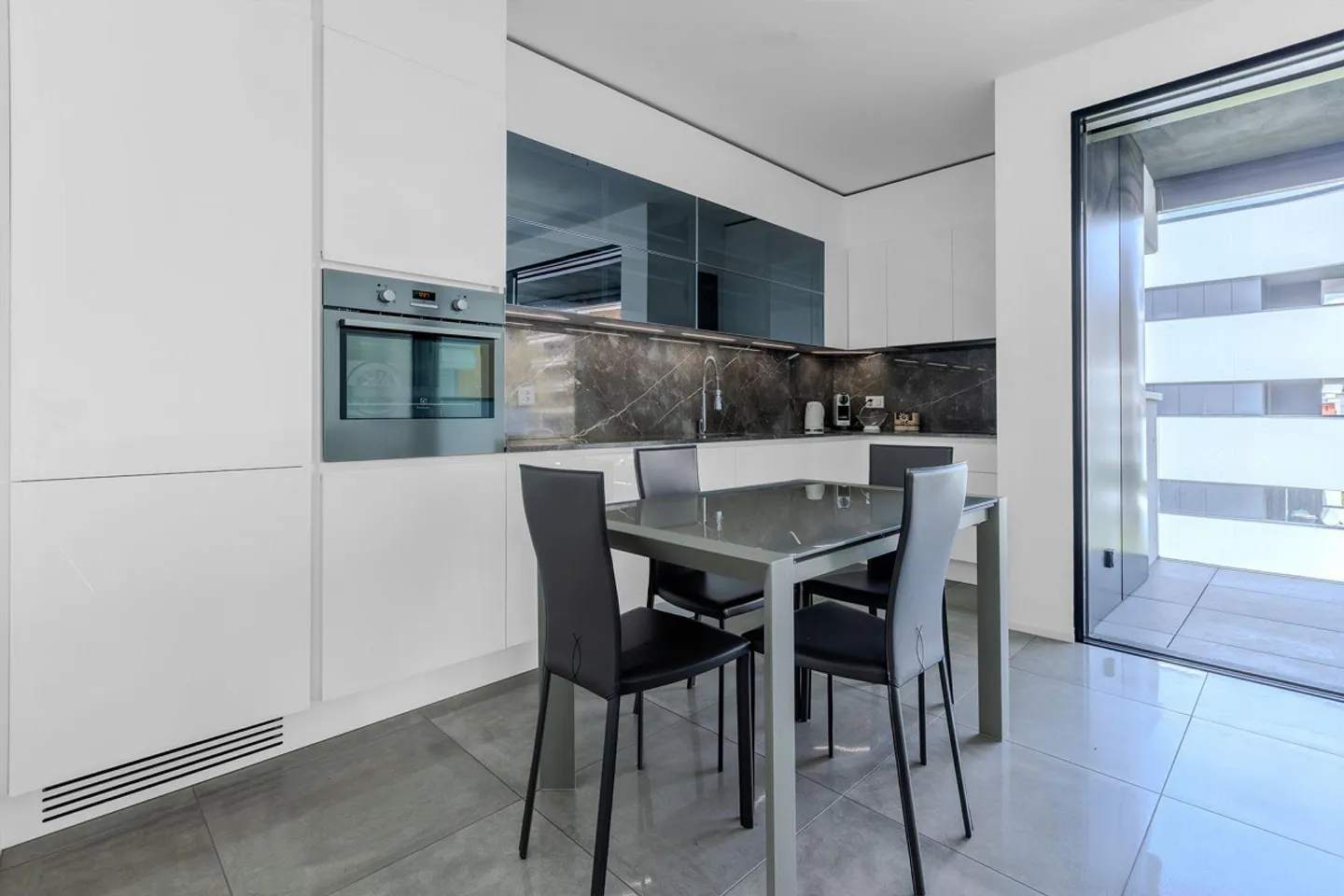 Moderne 2.5-Zimmer-Wohnung mit Terrasse in Pregassona - Foto 1 von 9