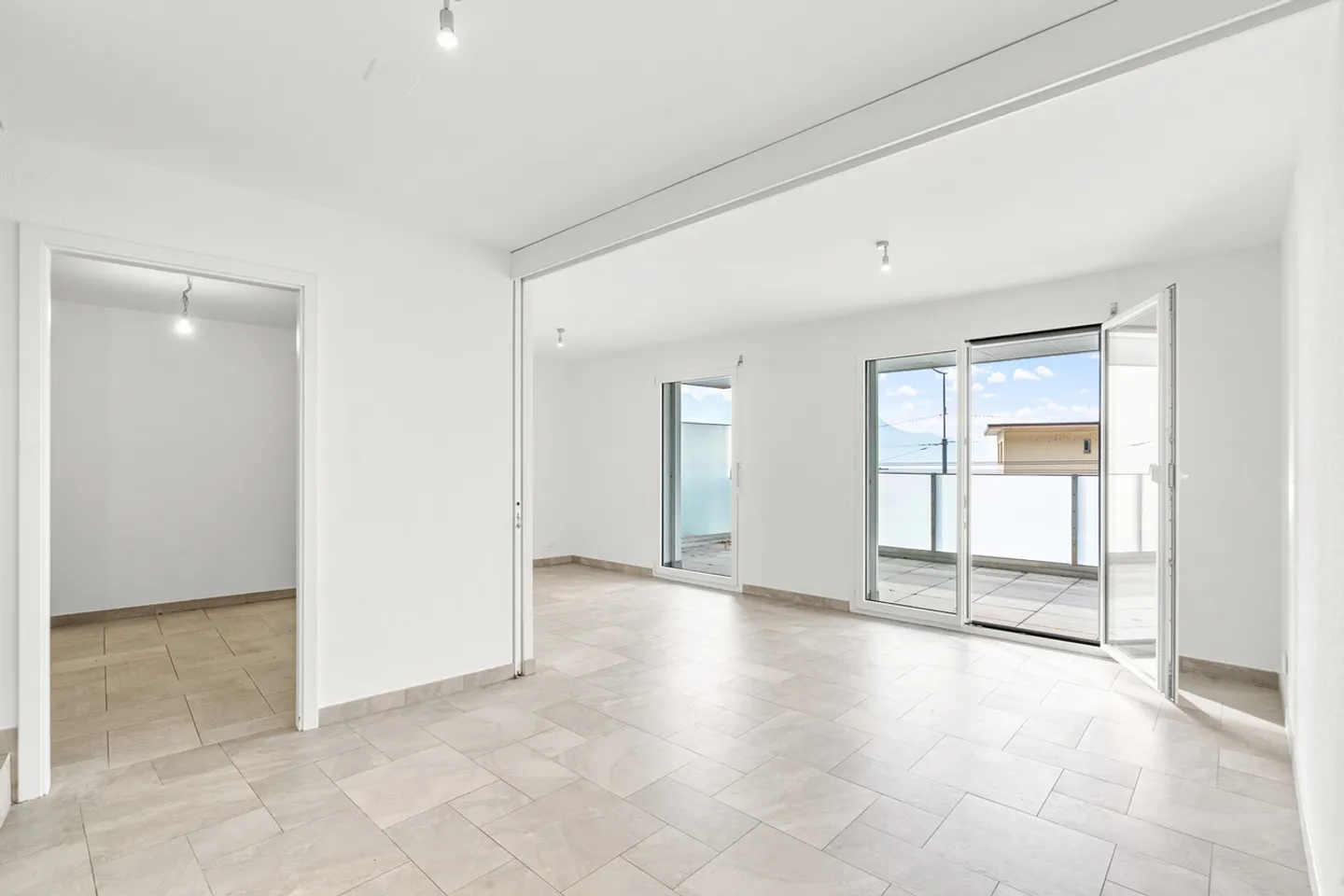 Contemporary duplex bathed in light with stunning lake view! - Photo 6 of 10